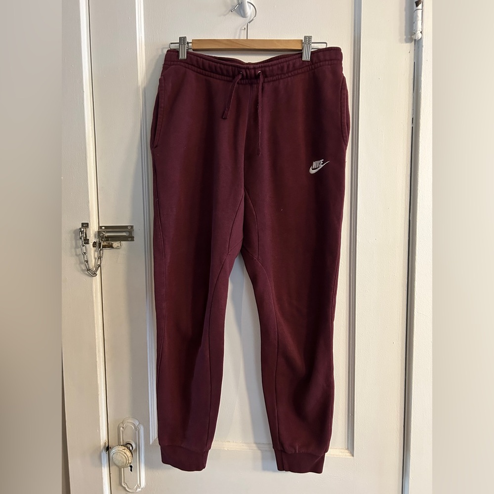 Nike Maroon Track Pants with White Swoosh